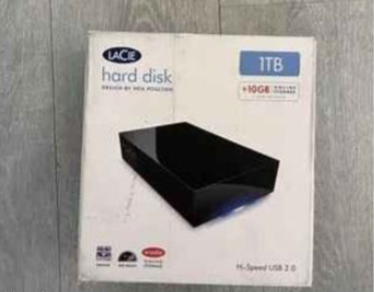 Disque dur externe Lacie 1TO en bon état et dans sa boite